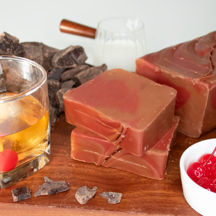 Black Cherry Bourbon Fudge, Indulge in the bold, decadent flavors of our Black Cherry Bourbon Fudge. Starting with creamy Belgian chocolate fudge, it’s infused with bourbon flavor and swirled with rich black cherry for a perfectly balanced bite of fruit and warmth. This non-alcoholic treat is as satisfying as it is unforgettable—go ahead and treat yourself, it's 5 o'clock somewhere!