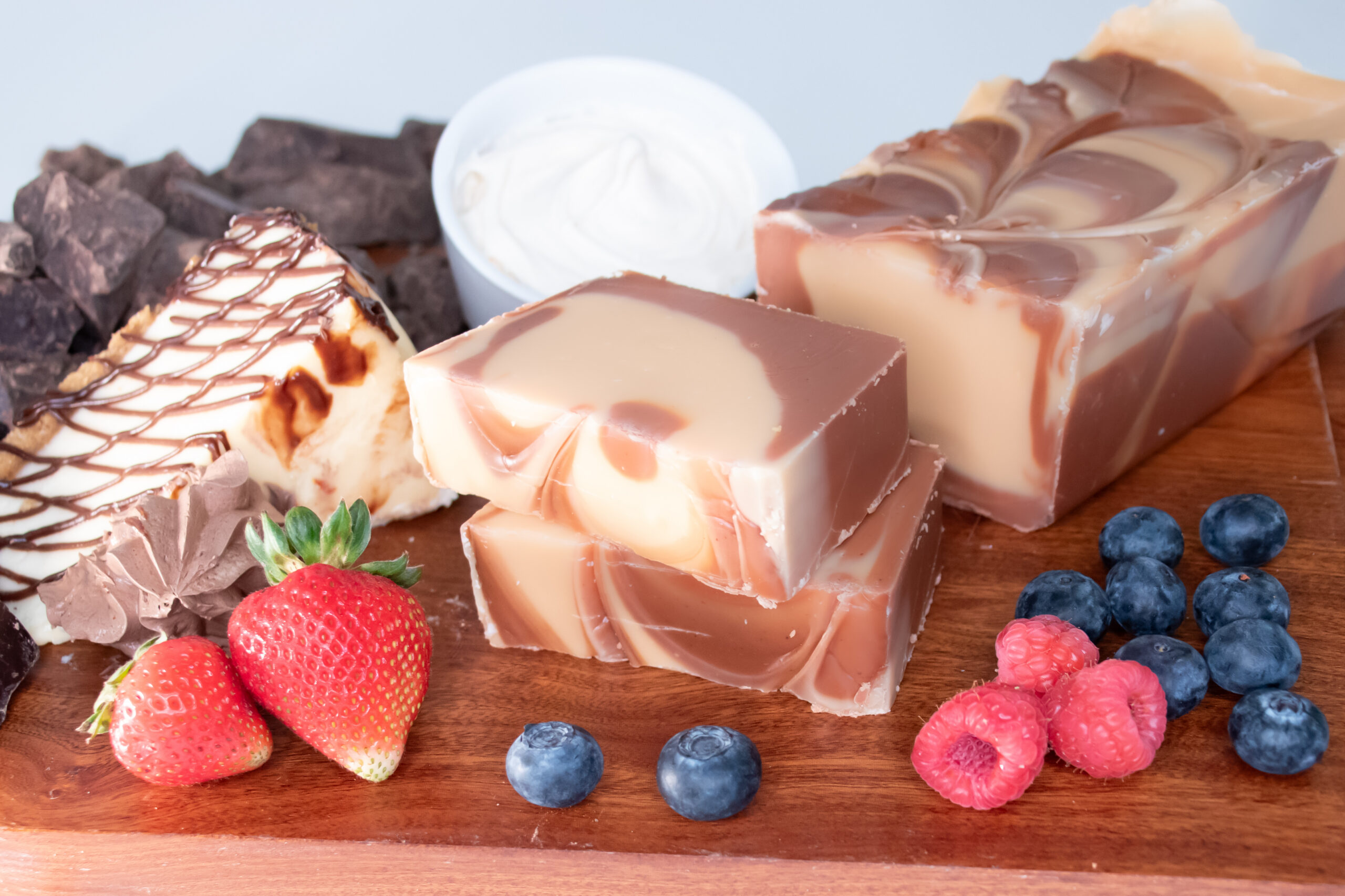 Chocolate Cheesecake Fudge, Our Chocolate Cheesecake Fudge combines Belgian chocolate fudge with layers of creamy cheesecake fudge for an irresistible treat. Each bite delivers a perfect balance of deep cocoa and tangy-sweet cheesecake richness. Pair this fudge with fresh fruit and berries for an extra burst of flavor.