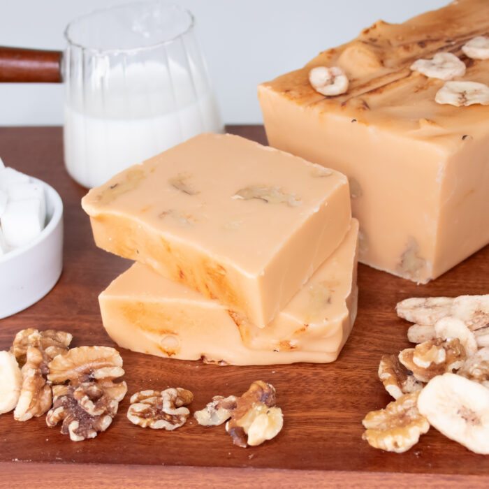 Bananas Foster Fudge, Inspired by the classic New Orleans dessert, our Bananas Foster Fudge captures the indulgent flavor found in the French Quarter. Creamy fudge is blended with notes of banana, brown sugar, and buttery rum-style flavor, then finished with crunchy walnuts and banana chips for the perfect contrast in texture. We even flambée the fudge to provide that unmistakable caramelized flavor. A tradition of The Big Easy, this fudge will have you saying, "Laissez le bon temps rouler!"