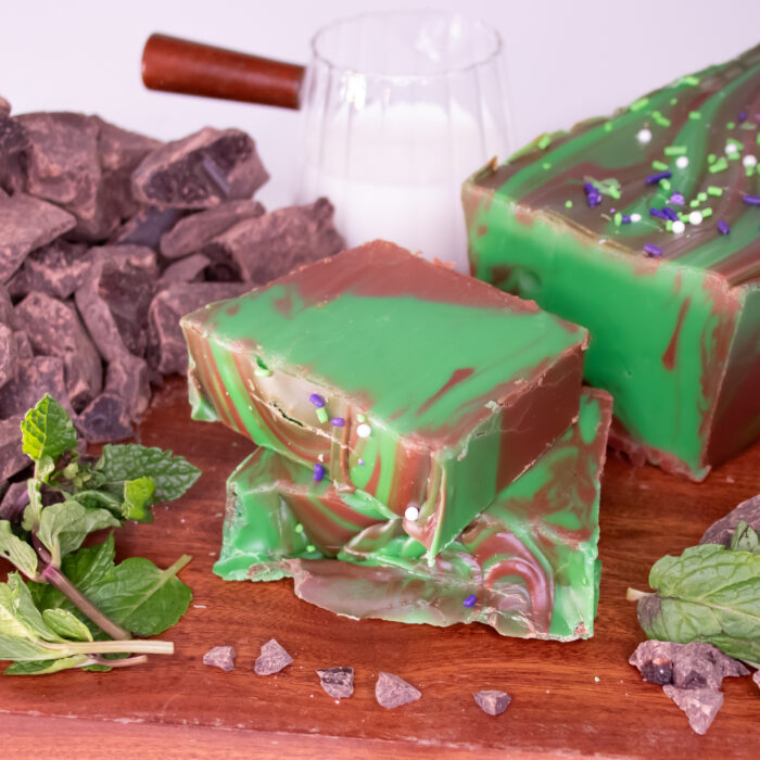 Mint Chocolate Fudge: Our Mint Chocolate Fudge begins with a Belgian chocolate base, swirled with a layer of mint fudge for a perfectly balanced combination. The mint adds an invigorating note without overpowering the rich chocolate. This timeless flavor pairing will leave you feeling refreshed and ready for another bite!